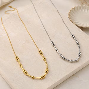 Personligt halsband med morsekod, personligt halsband med namn, dolt meddelande i morsekod, hemligt meddelandehalsband