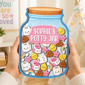 May include: A flat, jar-shaped sign with a light blue background and a wooden lid design. The text reads 'SOPHIE'S POTTY JAR' in pink. It features cartoon illustrations of toilet paper rolls, pink potties, yellow droplets, rainbows, and stars.