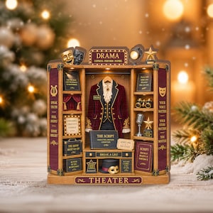 May include: A wooden theater-themed display shelf featuring a central maroon velvet coat on a hanger, surrounded by miniature props including a top hat, opera glasses, a microphone, and books labeled The Script. The structure includes text like Drama.