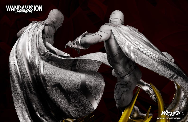 May include: A grayscale diorama featuring two figures with capes, set against a dark red background. The figures are in dynamic poses, suggesting action. The text "WANDAVISION DIORAMA" is visible at the top left.