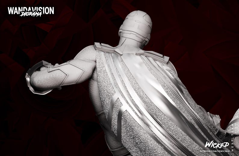 May include: A grayscale sculpture of a character from the WandaVision series. The figure is wearing a textured suit with a cape and helmet. The words "WandaVision Diorama" and "Wicked" are visible.