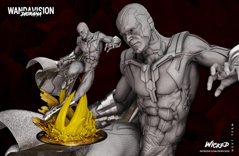 May include: A detailed grey diorama featuring two Vision figures from the WandaVision series. One figure is mid-flight above a golden base with yellow flames. The diorama has the text "WANDAVISION DIORAMA" and "WICKED" on it.