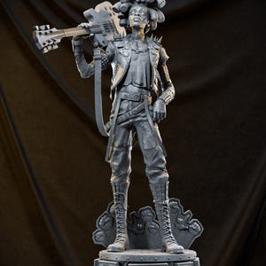 May include: A gray statue of a person holding a bass guitar, wearing a studded jacket, pants, and boots. The statue stands on a base with speakers. The figure has dreadlocks and a determined expression.