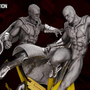 May include: A grayscale diorama of two Vision figures in action poses. The figures have metallic detailing and capes, set against a dark red background. The text "WandaVision Diorama" is at the top, and "Wicked" and "Next Term" are at the bottom.