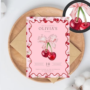 Puede incluir: Una invitación de cumpleaños rosa con temática de cerezas. La invitación presenta el texto "Olivia's Birthday" y "She is the cherry on top". El diseño incluye cerezas de acuarela y un lazo rosa. La fecha es el miércoles 18 de diciembre de 2030.