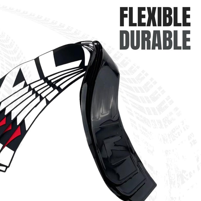 May include: A black, flexible, and durable product with white and red accents. The product has the words "FLEXIBLE" and "DURABLE" in bold, black text. The product is curved and appears to be made of a glossy material.