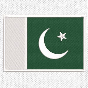 May include: A rectangular embroidered patch featuring the flag of Pakistan. The design includes a vertical white stripe on the left side and a dark green field on the right, centered with a white crescent moon and a five-pointed star.
