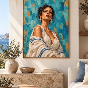 Puede incluir: Una impresión de arte mural enmarcada que presenta el retrato de una persona de cabello oscuro con pendientes dorados y una prenda blanca con rayas azules, sobre un fondo texturizado de pinceladas vibrantes en turquesa y dorado.