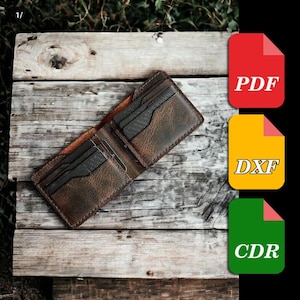 May include: Open brown leather wallet with multiple card slots, displayed on a rustic wooden surface. The wallet is open, revealing the interior compartments. The image also includes red, yellow, and green file icons with the text "PDF", "DXF", and "CDR".