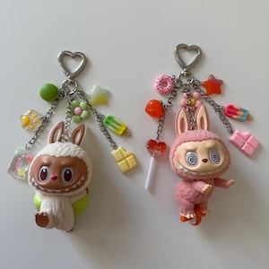 The Monsters PopMart lazy yoga series figures keychains| bag charms