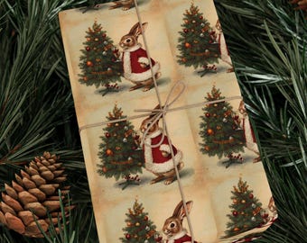 May include: Wrapped gift with a vintage Christmas-themed paper featuring a rabbit in a red coat and a decorated Christmas tree. The gift is tied with twine and set against a backdrop of pine needles and pine cones.