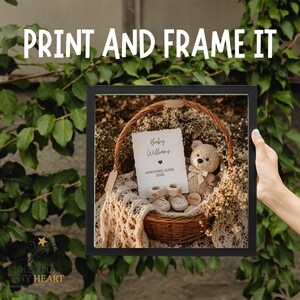 Rustic baby announcement basket featuring a plush teddy bear, cream knit booties, baby's breath flowers, and a card reading "Baby Williams Arriving June 2026" on a beige macrame blanket.