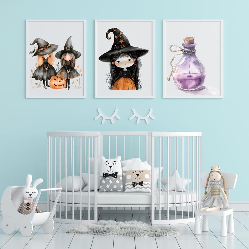 May include: Three framed watercolor prints with a Halloween theme. The prints feature illustrations of witches, a potion bottle, and a pumpkin. The prints are displayed above a white crib with decorative pillows and a toy stroller.