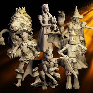 May include: A set of sculptures featuring characters from The Wizard of Oz. The figures include the Cowardly Lion, Dorothy with Toto, the Scarecrow, the Wicked Witch, the Tin Man, and a flying monkey, all in a monochromatic colour scheme.