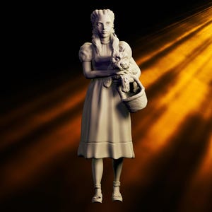 May include: A 3D-printed figurine of a young woman in a dress, holding a small dog in a basket. The figurine is in a neutral color, with details of the dress, hair, and dog visible. The background is dark with a golden light.