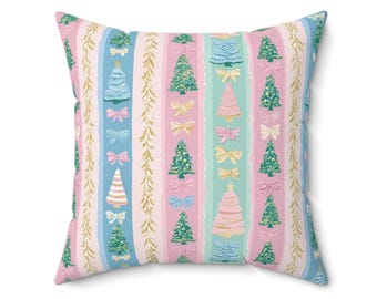Cojín decorativo navideño en tonos pastel, 40x40 cm, 45x45 cm, 50x50 cm, con lazo y rayas navideñas. Decoración invernal en rosa, azul y verde para sofá o cama.