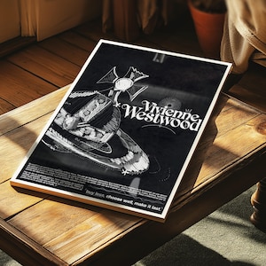 May include: A monochrome poster with a shoe sketch and the Vivienne Westwood logo. The poster includes the text "buy less, choose well, make it last."