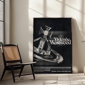 May include: Black and white Vivienne Westwood poster with a hat design and the brand's logo. The poster includes the text "buy less, choose well, make it last". The poster is framed.
