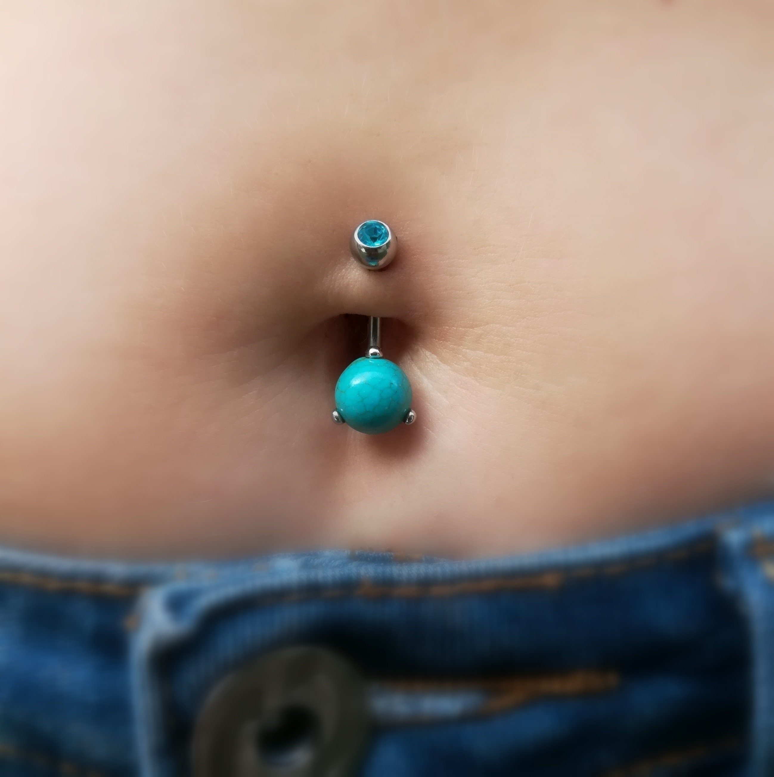 Belly button piercing blue sale