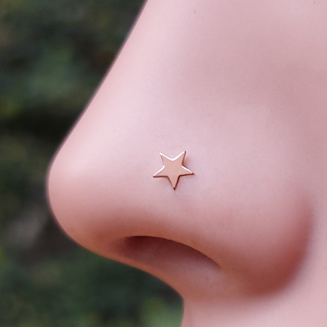 Star design shop nose pin