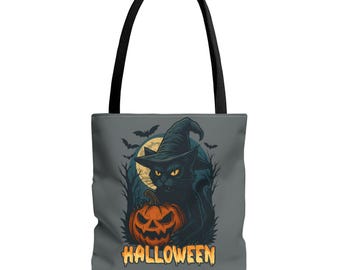 May include: Gray tote bag featuring a black cat wearing a witch hat and holding a carved orange pumpkin. The design includes a full moon, bats, and the word "HALLOWEEN" in orange letters.
