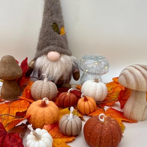 Pumpkin candle. Autumn candle. Scented candle. Halloween candles. Halloween decoration.