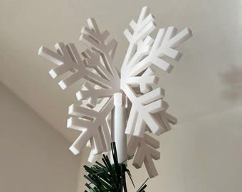 Adorno para la punta del árbol en forma de copo de nieve