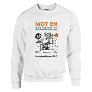 May include: White sweatshirt with the text "MOT EN IKKE-ARKITEKTUR" in orange and black, along with an abstract architectural drawing. The text "Simplicius Ødegaard 1967" is printed at the bottom.