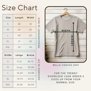 May include: A beige Bella Canvas 3001 t-shirt on a hanger, with a size chart showing measurements in cm for length and width. Sizes range from S to XXL. The text suggests ordering two sizes up for an oversized fit. The shirt's length is 71.12 cm to 81.28 cm.