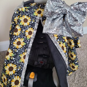 Funda para asiento de coche con diseño de girasol y brillo negro, lazo personalizado para bebé, regalo para niña recién nacida, lista para enviar.