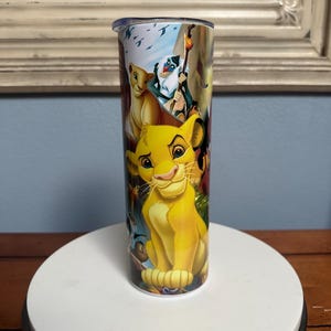 20 oz lion king  tumbler  . great for hot and cold drinks and comes with a straw