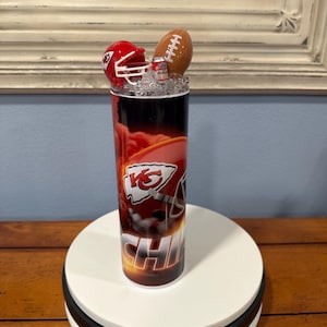 20 oz Kansas City Chiefs football tumbler with topper  . great for hot and cold drinks and comes with a straw.