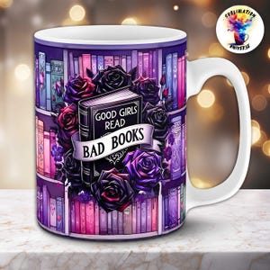 May include: White ceramic mug featuring a bookshelf design with a central image of a book surrounded by black and purple roses. The book has the text "GOOD GIRLS READ BAD BOOKS" on the cover and a banner. The mug has a white handle.
