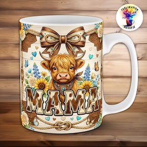 May include: White ceramic mug featuring a Highland cow design with the word "MAMA". The mug has a brown bow, sunflowers, and blue flowers. The design includes butterflies, hearts, and rope accents. The mug has a white handle.