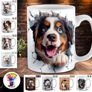 May include: White ceramic mug featuring a smiling Bernese Mountain Dog puppy bursting through a cracked wall design. Additional mugs with various dog breeds are displayed. The mugs are on a wooden surface.
