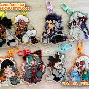 May include: Collection of anime-style acrylic keychains featuring various characters with unique designs. Each keychain has a colorful design and a metal clasp. The text "ONLY AVAILABLE AT MELOMICHU.ETSY.COM" and "Not on Etsy? ITS A SCAM" are visible.
