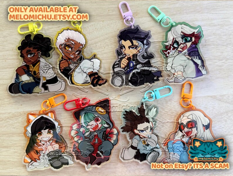 May include: Collection of anime-style acrylic keychains featuring various characters with unique designs. Each keychain has a colorful design and a metal clasp. The text "ONLY AVAILABLE AT MELOMICHU.ETSY.COM" and "Not on Etsy? ITS A SCAM" are visible.
