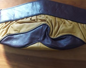 Rare Vasilis for Trotting gold and burgundy leather, clutch bag