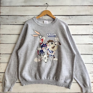 RARE Vintage 90s Distressed USA Soccer Warner Bros Sweatshirt USA Crewneck Usa Pullover Usa Sweater Printed Logo Gray Color Men&#39;s L