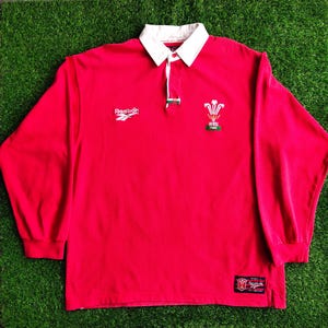 メンズ Under Armour ISUZU ウェールズ WRU ラグビー ジャージ シャツ