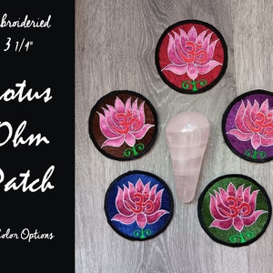 May include: Five embroidered iron-on patches featuring a pink lotus flower with an Om symbol in the center. The patches are 3 1/4 inches in diameter and come in five different colors: red, brown, purple, blue, and green.