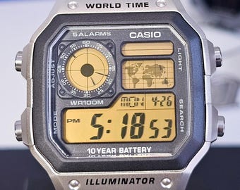 Reloj Casio AE1200 Custom Mod: Pantalla LCD a color única - Reloj de pulsera digital con hora mundial