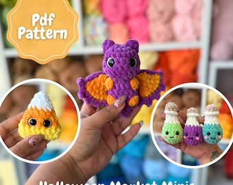May include: A collection of handmade crochet Halloween-themed mini figures. Includes a purple bat with orange wings, a candy corn, and three potion bottles. The image also includes the text "Pdf Pattern" and "Halloween Market Minis".