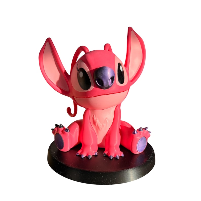Figura coleccionable de ángel: personaje extraterrestre rosa inspirado en Lilo y Stitch imagen 1