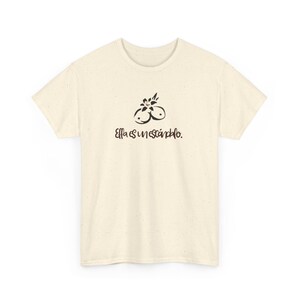 Ella es un escandalo- Unisex Heavy Cotton Tee Tropicoqueta - Casual Wear, Everyday Comfort, Eco-friendly Fashion - Karol G