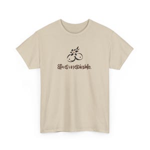 Ella es un escandalo- Unisex Heavy Cotton Tee Tropicoqueta - Casual Wear, Everyday Comfort, Eco-friendly Fashion - Karol G