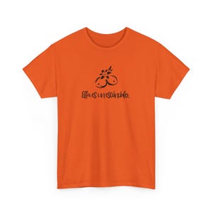 Ella es un escandalo- Unisex Heavy Cotton Tee Tropicoqueta - Casual Wear, Everyday Comfort, Eco-friendly Fashion - Karol G