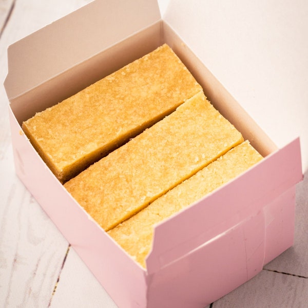 BELIEVE biscuits from Ted Lasso. Pink boss box with classic, delicious, buttery shortbread cookies.