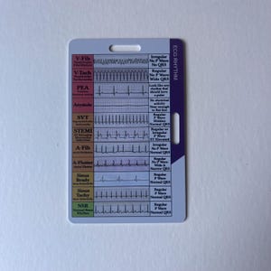 May include: A white and purple ECG rhythm reference card. The card features various ECG rhythms with descriptions, including V-Fib, V-Tach, PEA, Asystole, SVT, STEMI, A-Fib, A-Flutter, Sinus Brady, Sinus Tachy, and NSR.