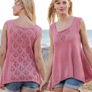 May include: A sleeveless pink knit top featuring a scoop neckline and a repeating leaf-shaped lace pattern on the back panel, while the front panel is constructed with a smooth, solid knit texture and a flared, asymmetrical hemline.